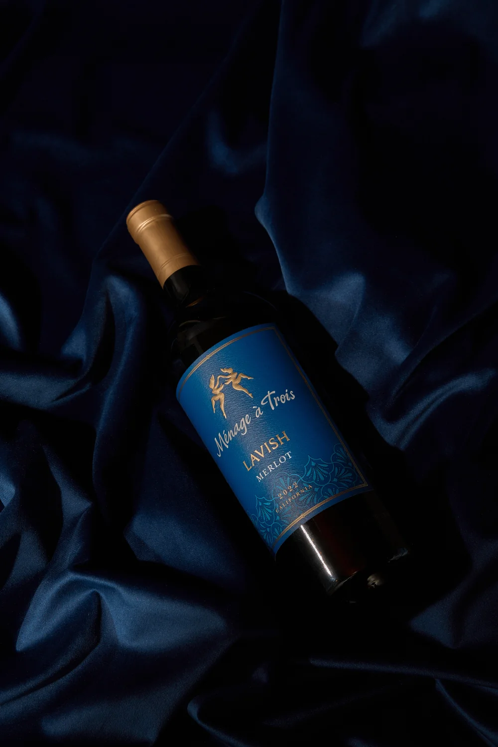 Bottle of Ménage à Trois Lavish Merlot red wine